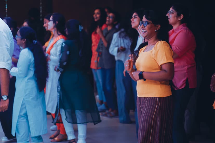 People raising hands in worship