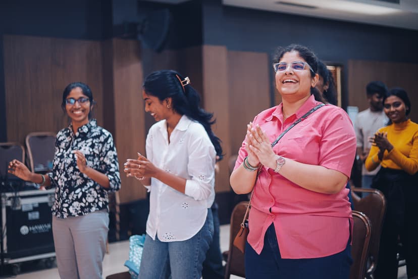 People raising hands in worship